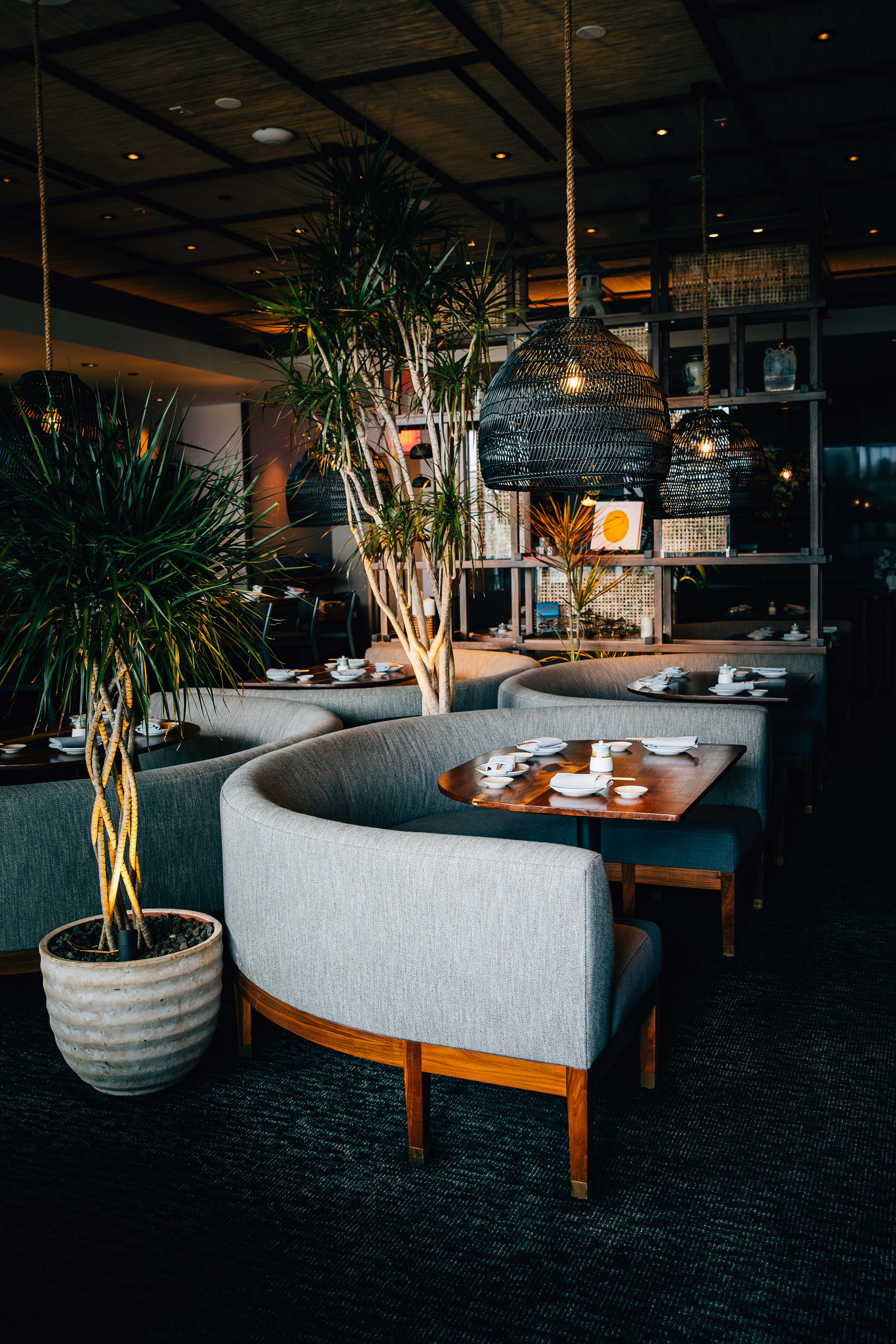 a table topped with a blue chair