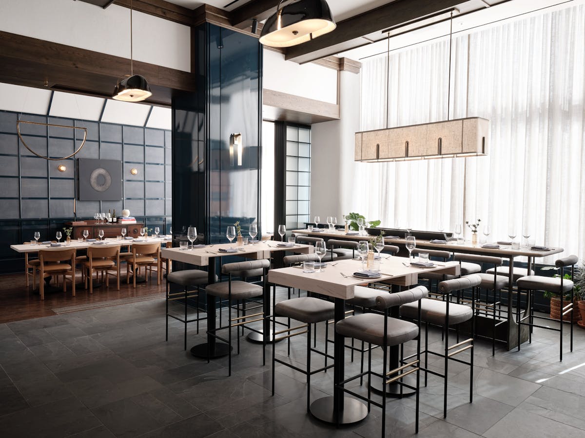 a dining room table in front of a building
