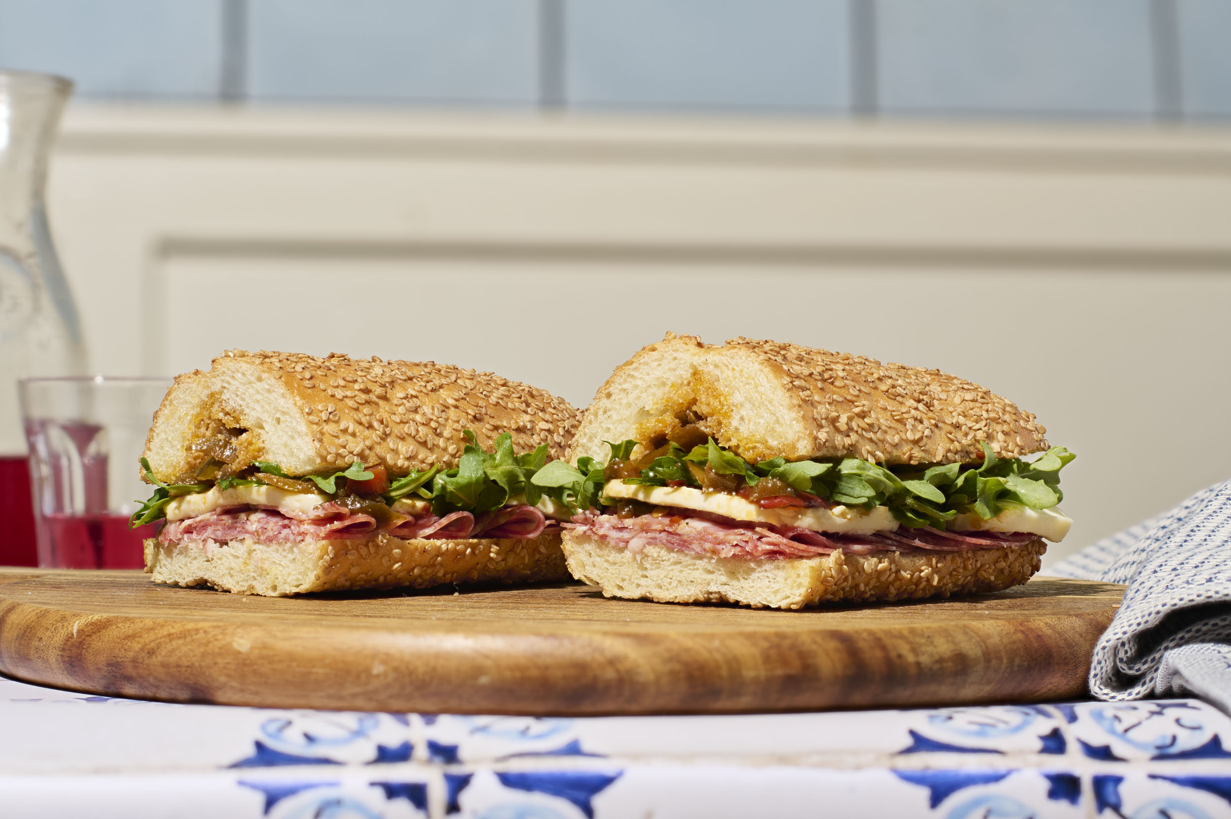 a sandwich on a wooden board