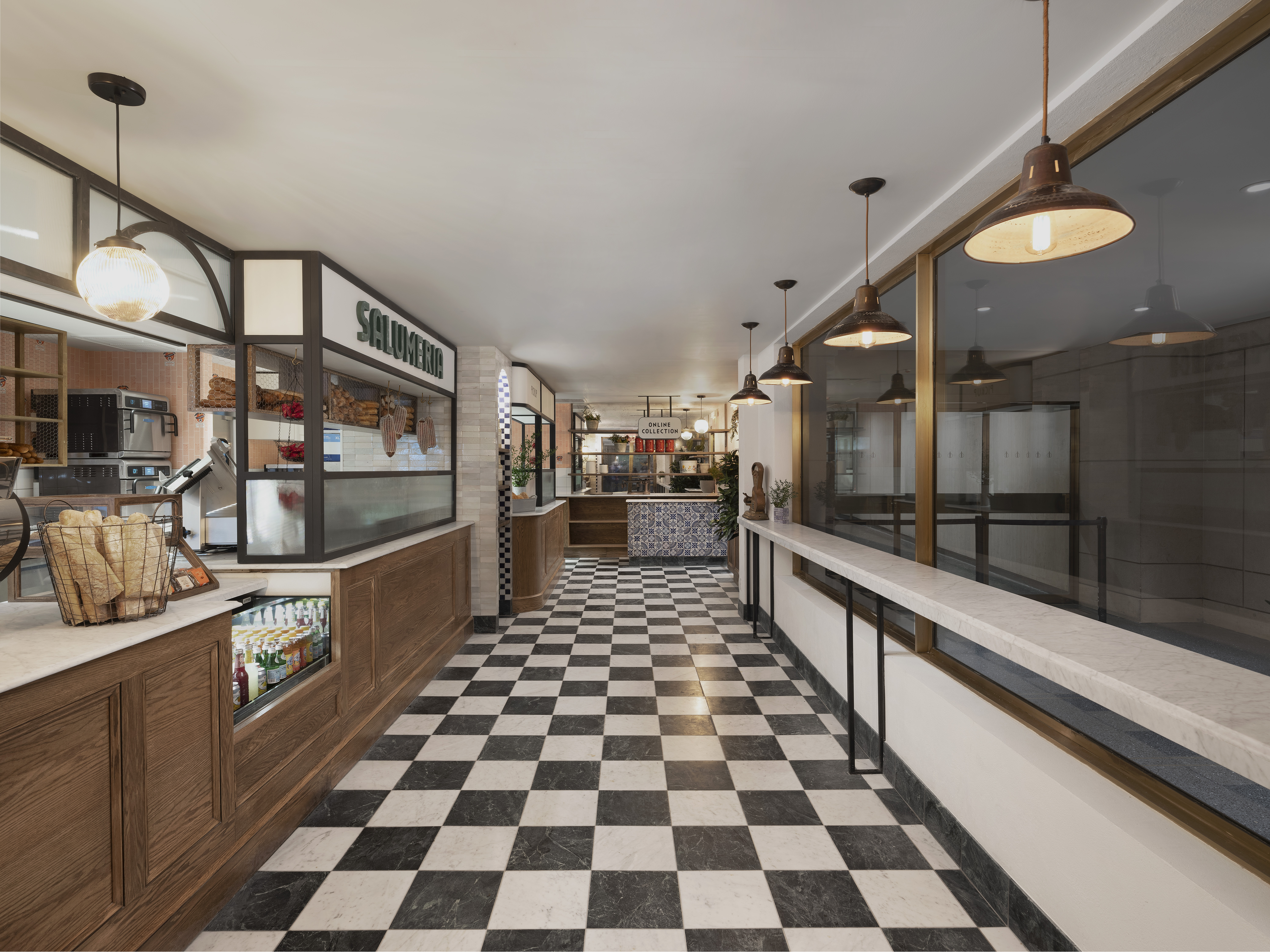 a black and white checkered floor with a counter and a bar
