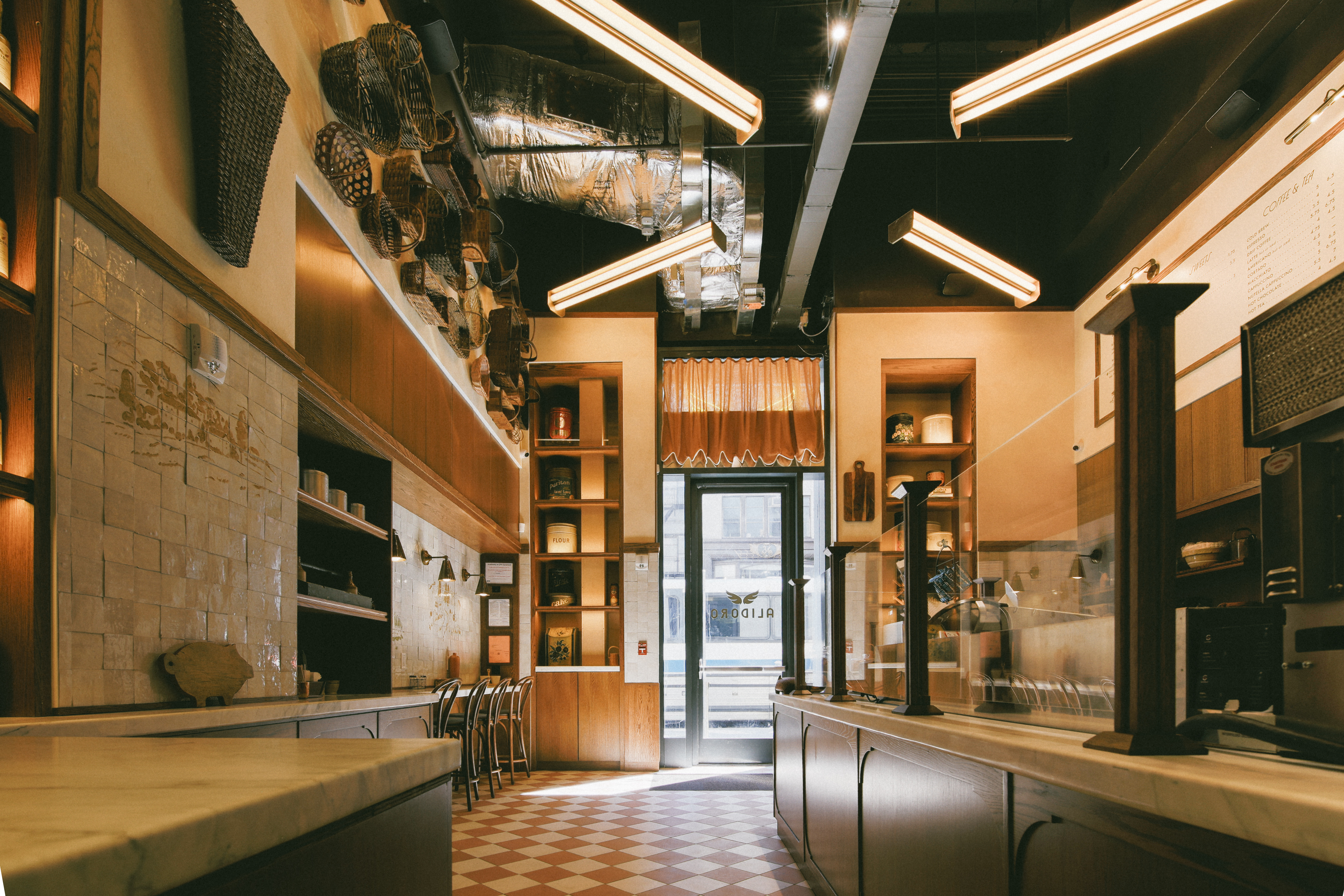 a room with a counter and shelves