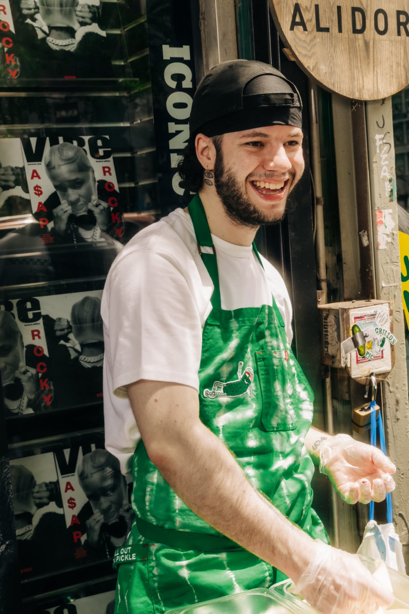 a man wearing a hat and apron