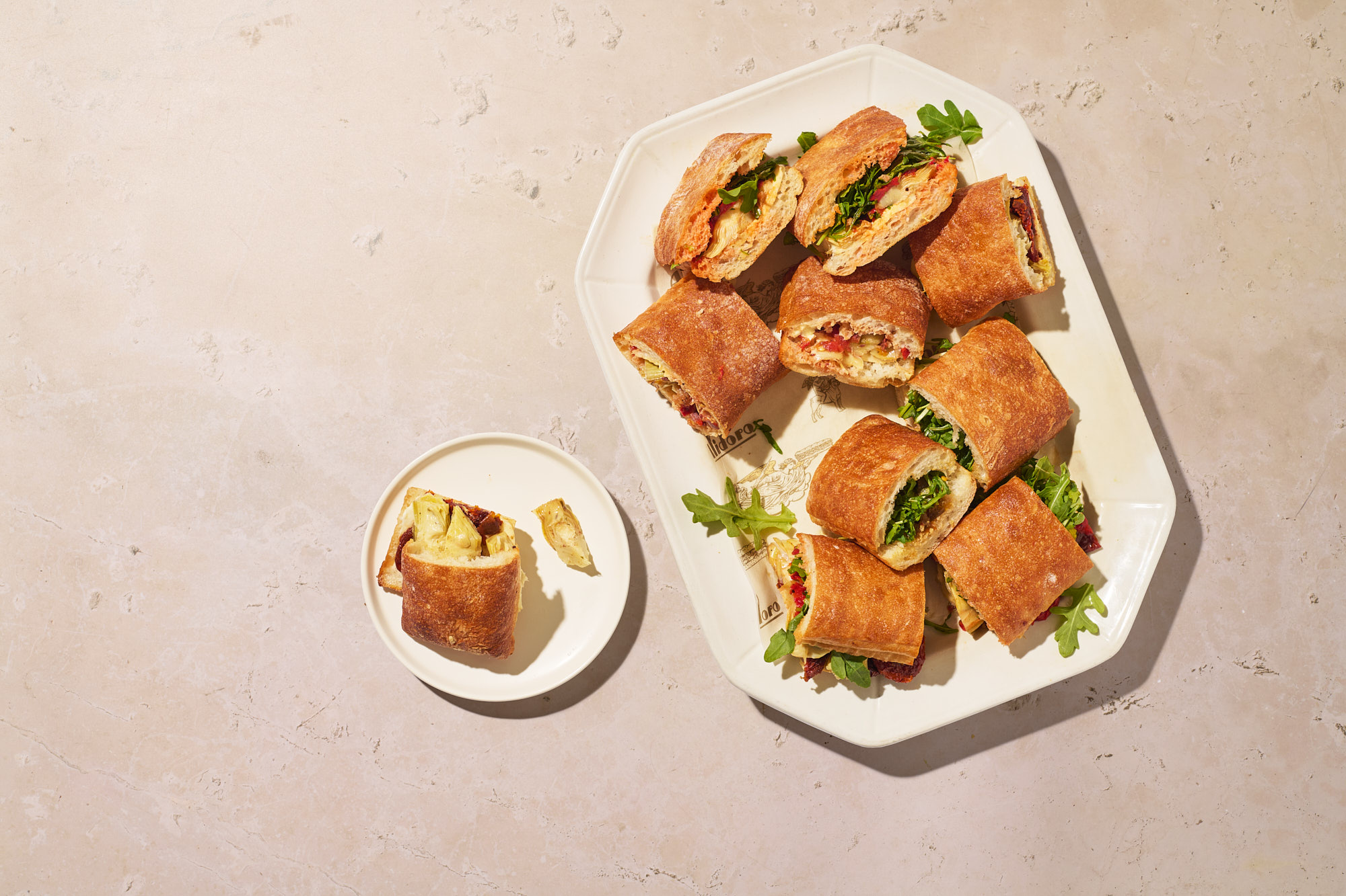 a plate of sandwiches on a table