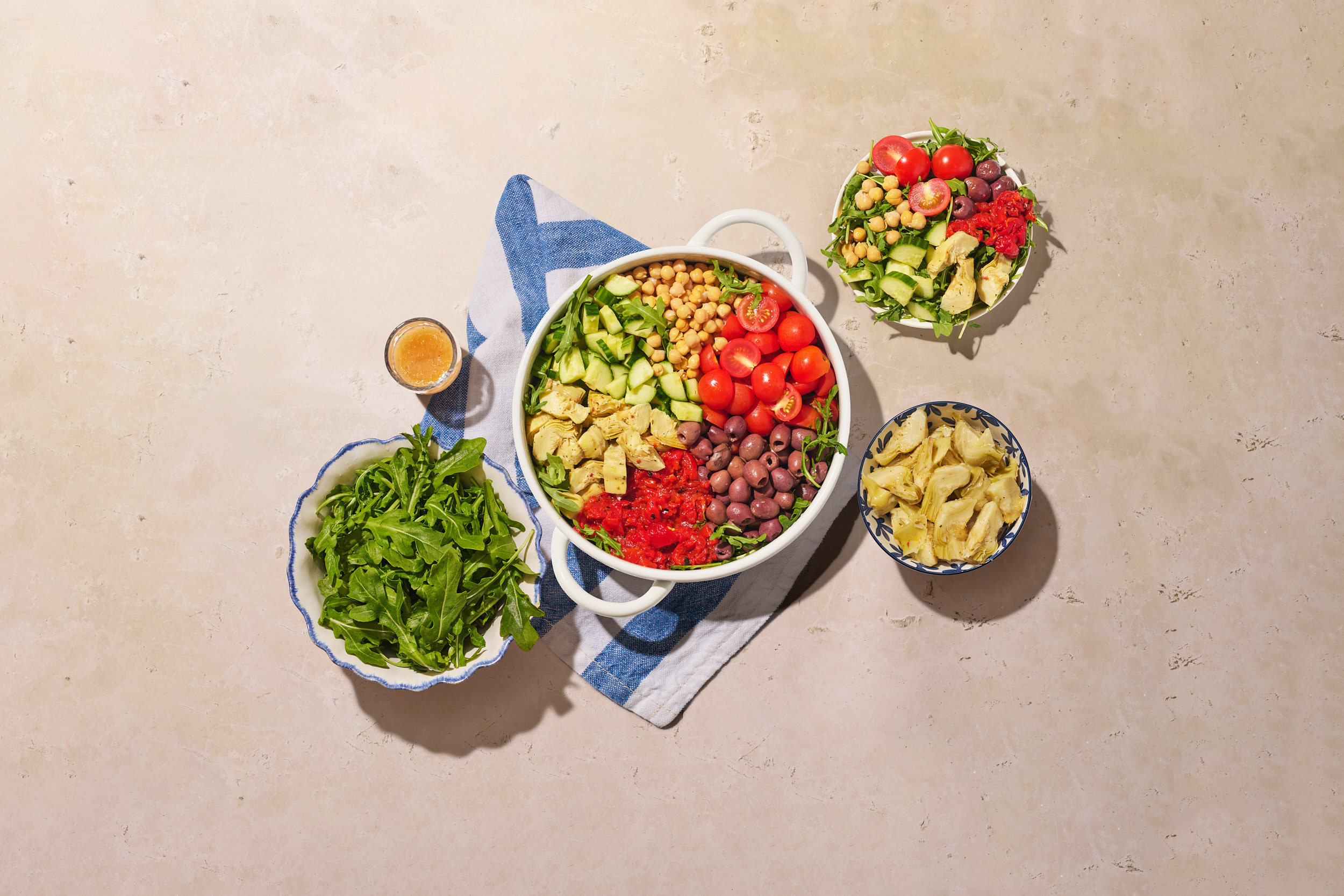 a bowl of salad with different kinds of food in it