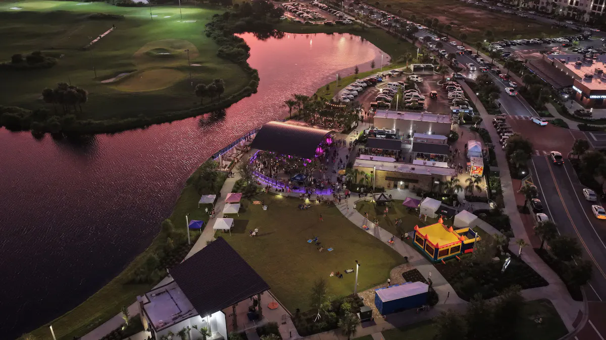 Aerial view of Lakeside Social and its outdoor gathering spaces in Viera at dusk.