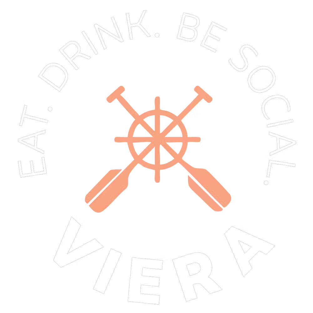 a logo with a steering wheel and paddles