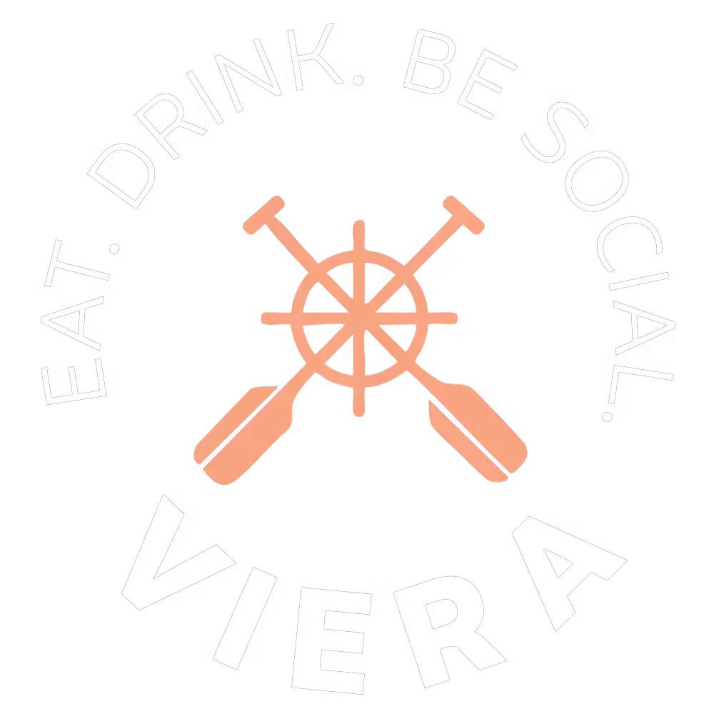 a logo with a steering wheel and paddles