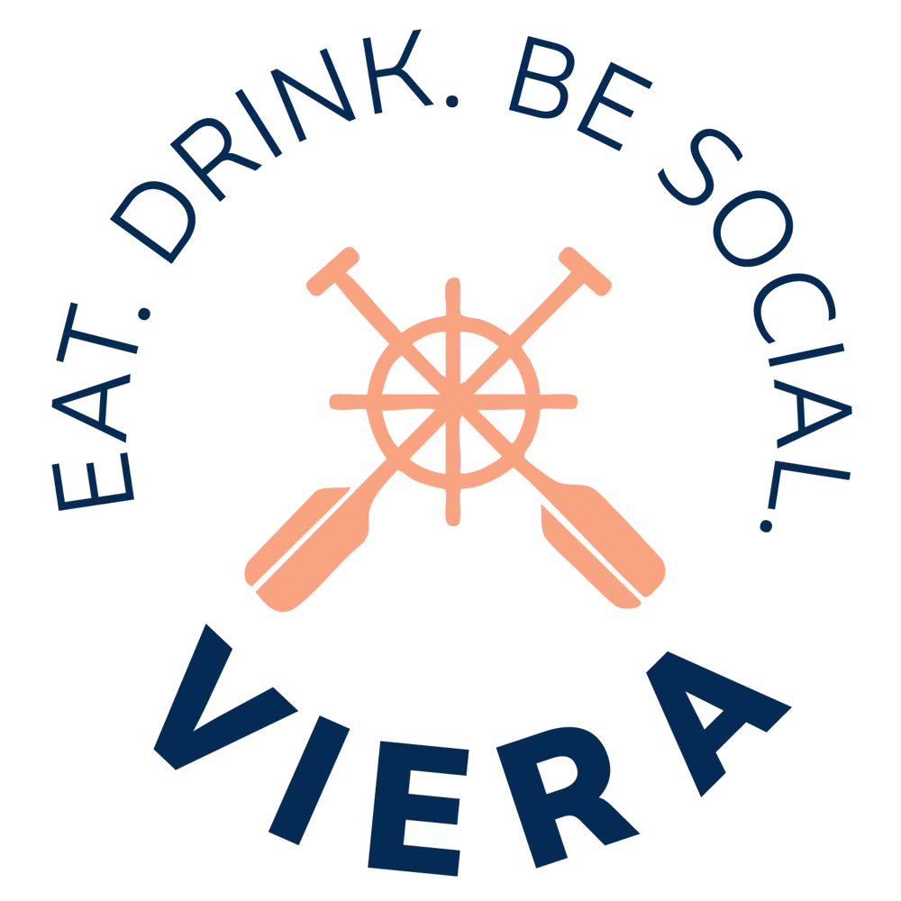 a logo with a steering wheel and paddles