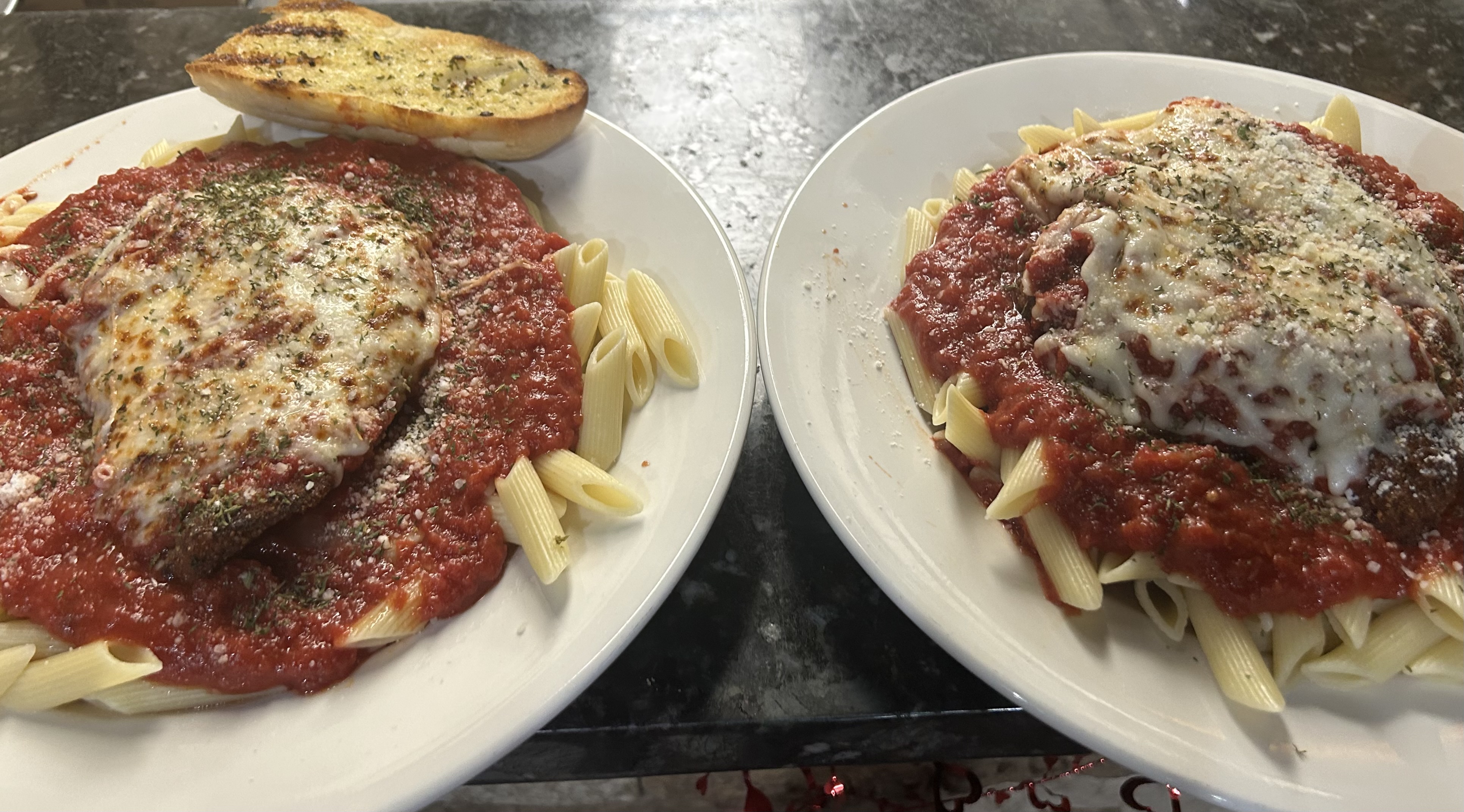 a plate of food with a slice of pizza