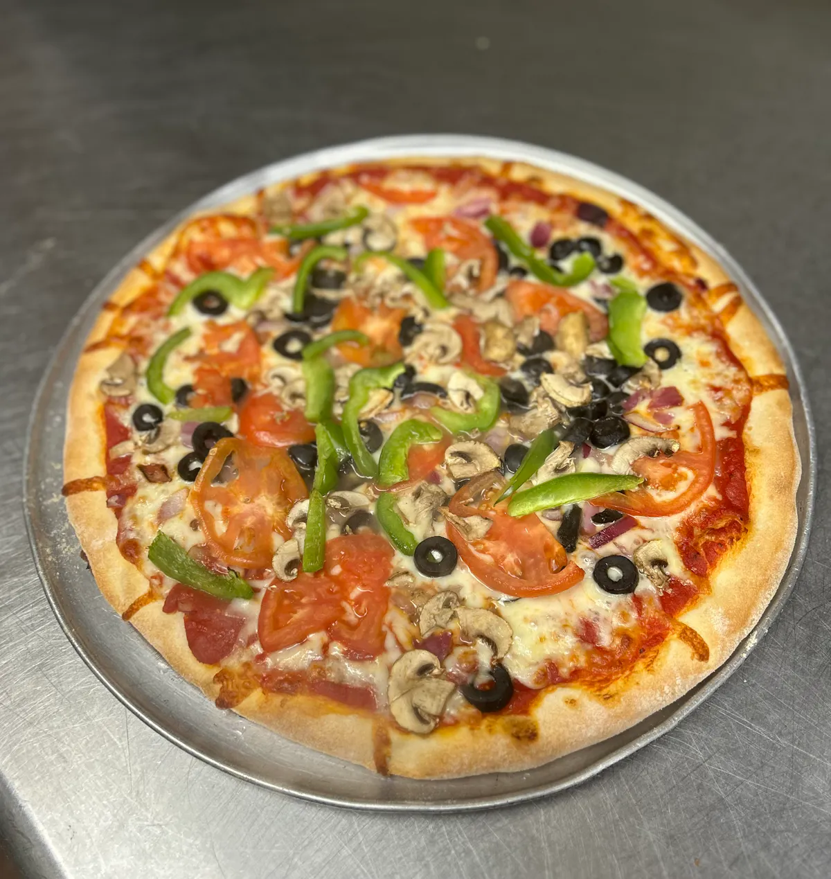 a pizza sitting on top of a table
