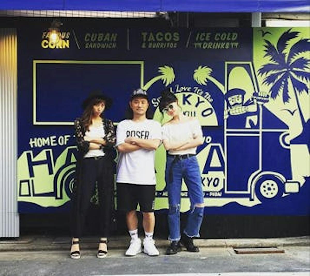 a group of people standing in front of a building