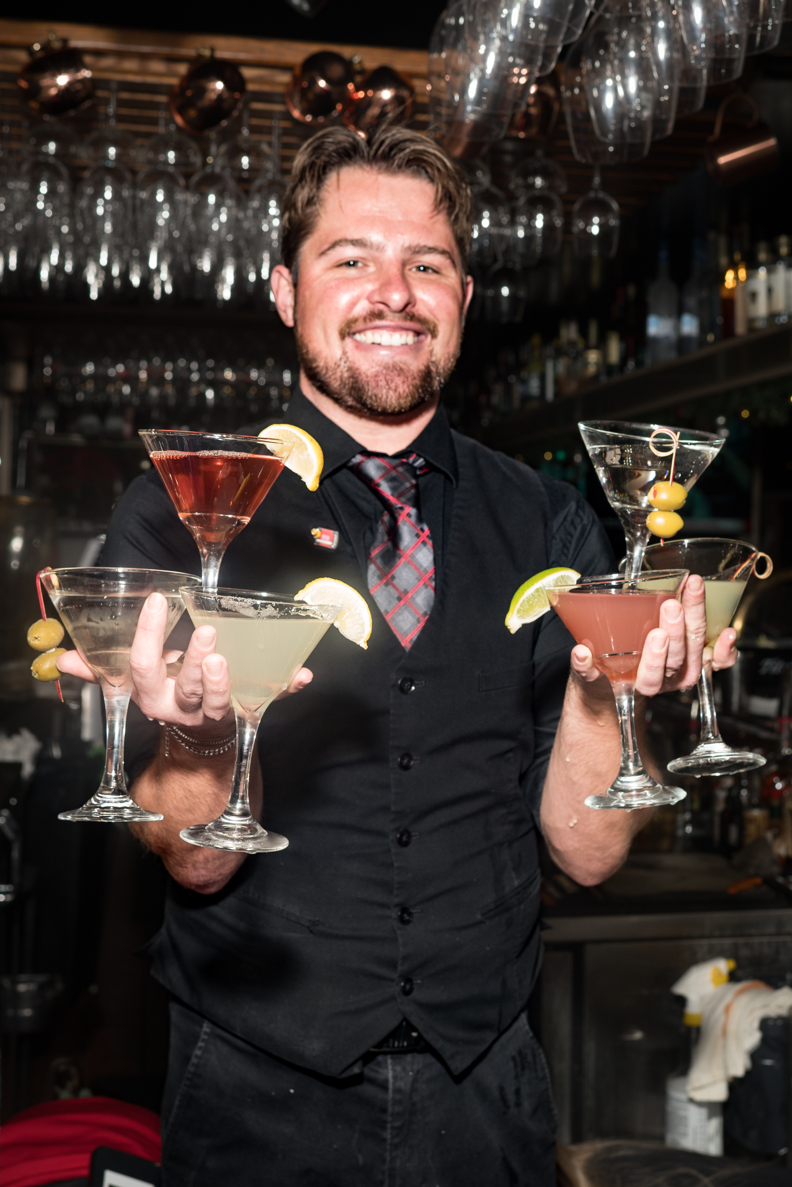 a person holding a glass of wine