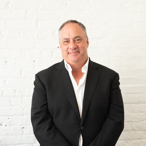 a man wearing a suit and tie
