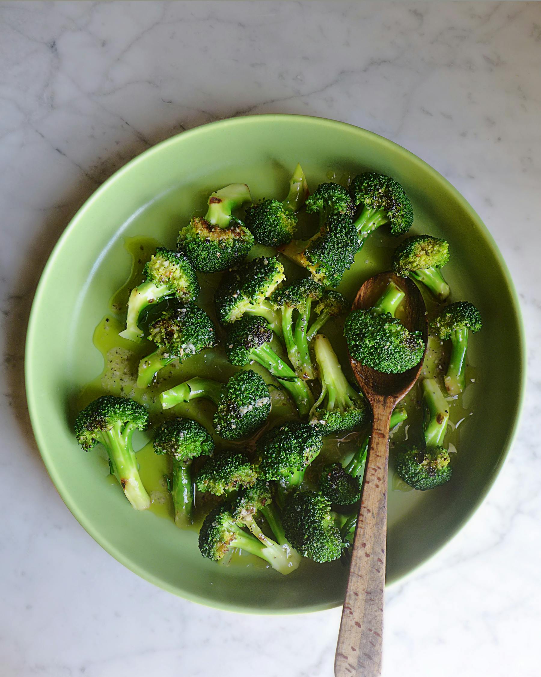 a bowl of food with broccoli