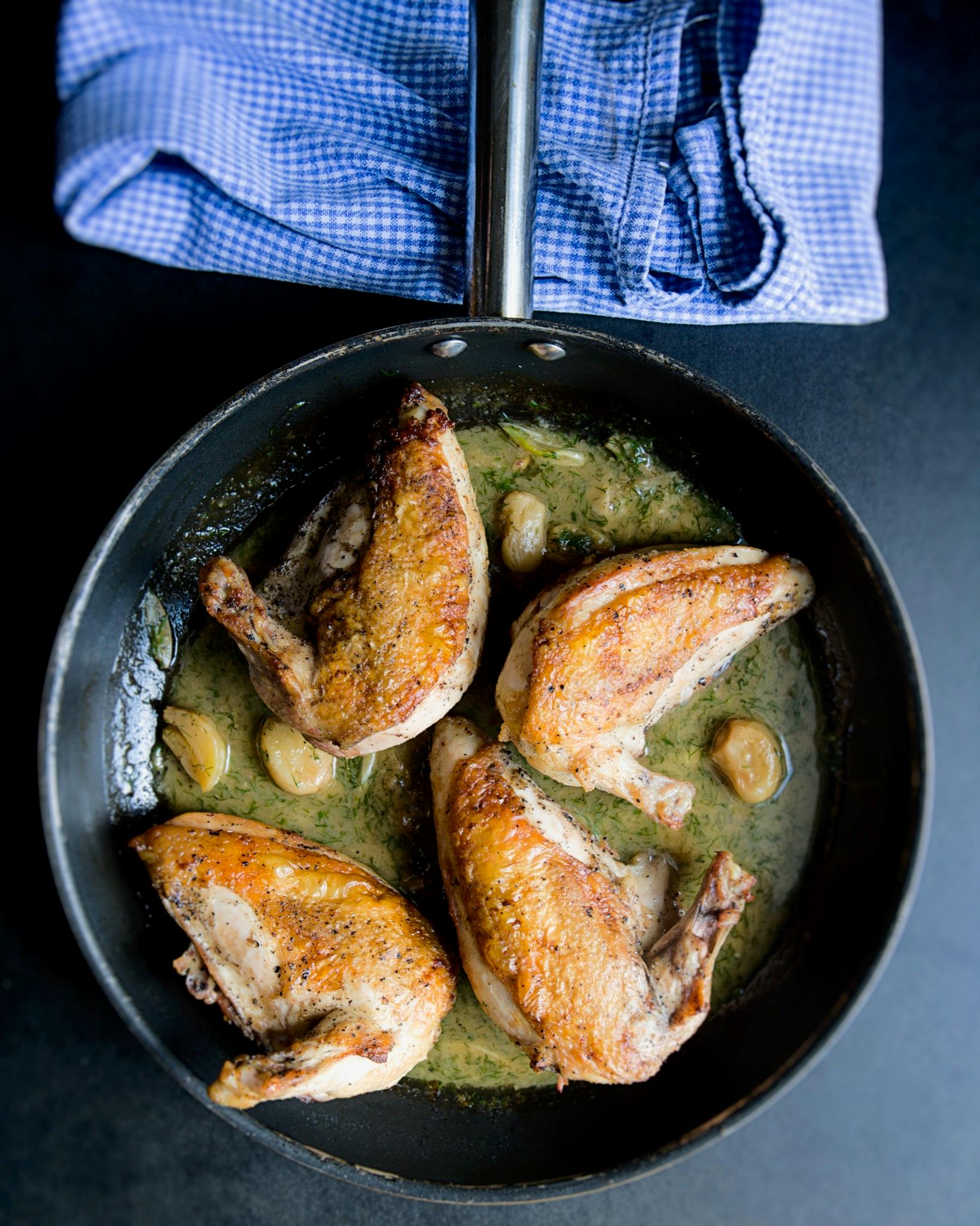 a pan filled with fried chicken