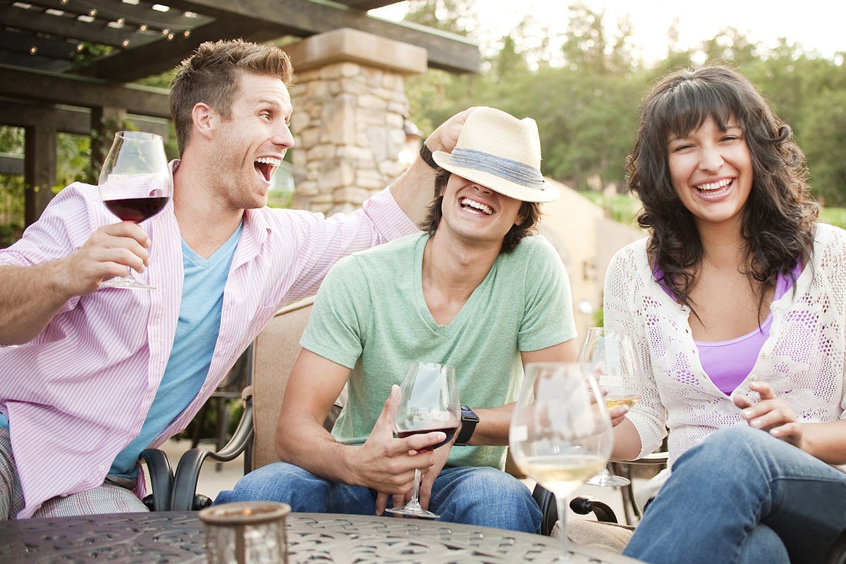 a couple of people that are sitting on a bench