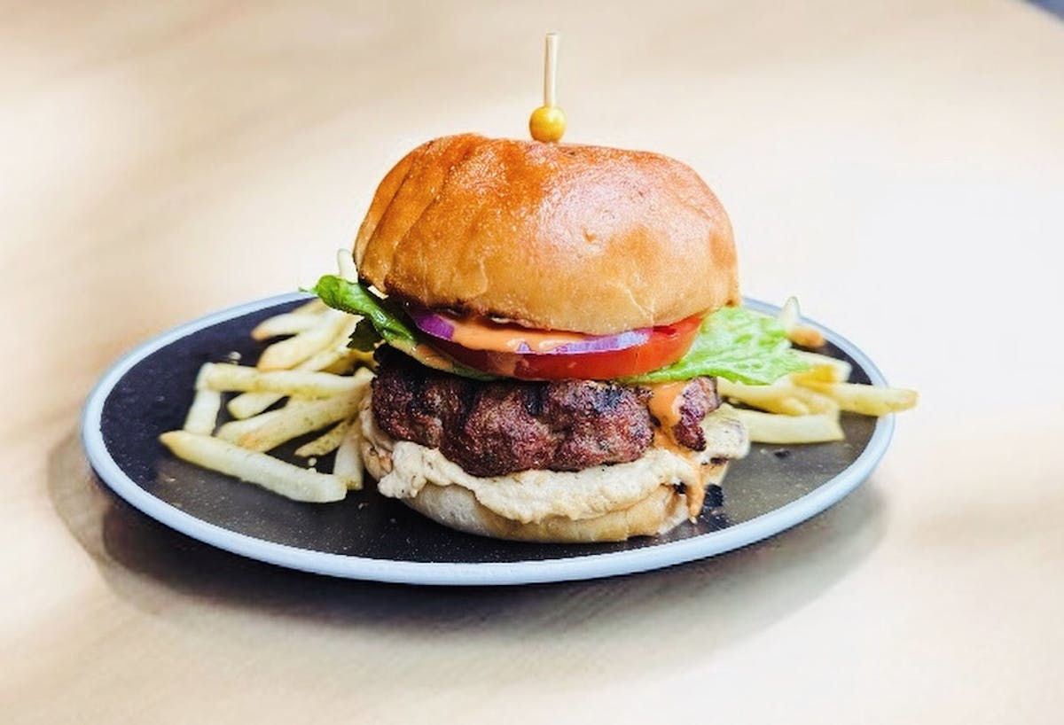 a sandwich sitting on top of a plate of food