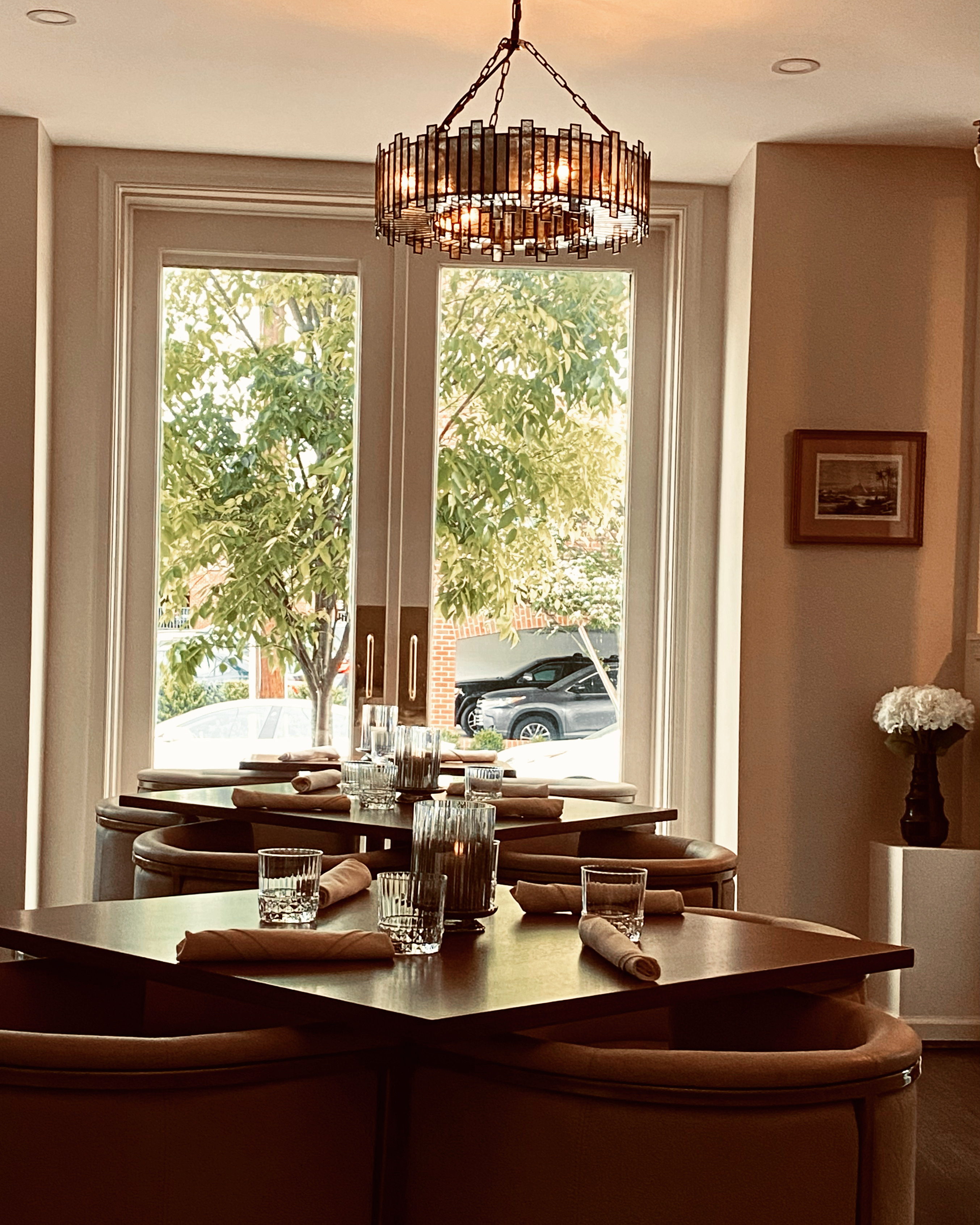 a room filled with furniture and a large window