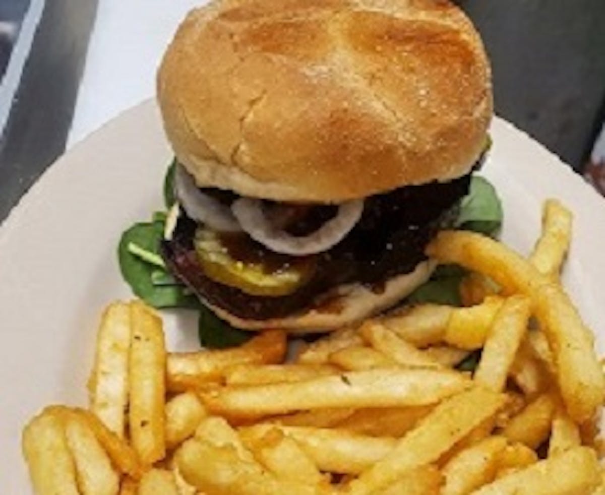 a sandwich and fries on a plate