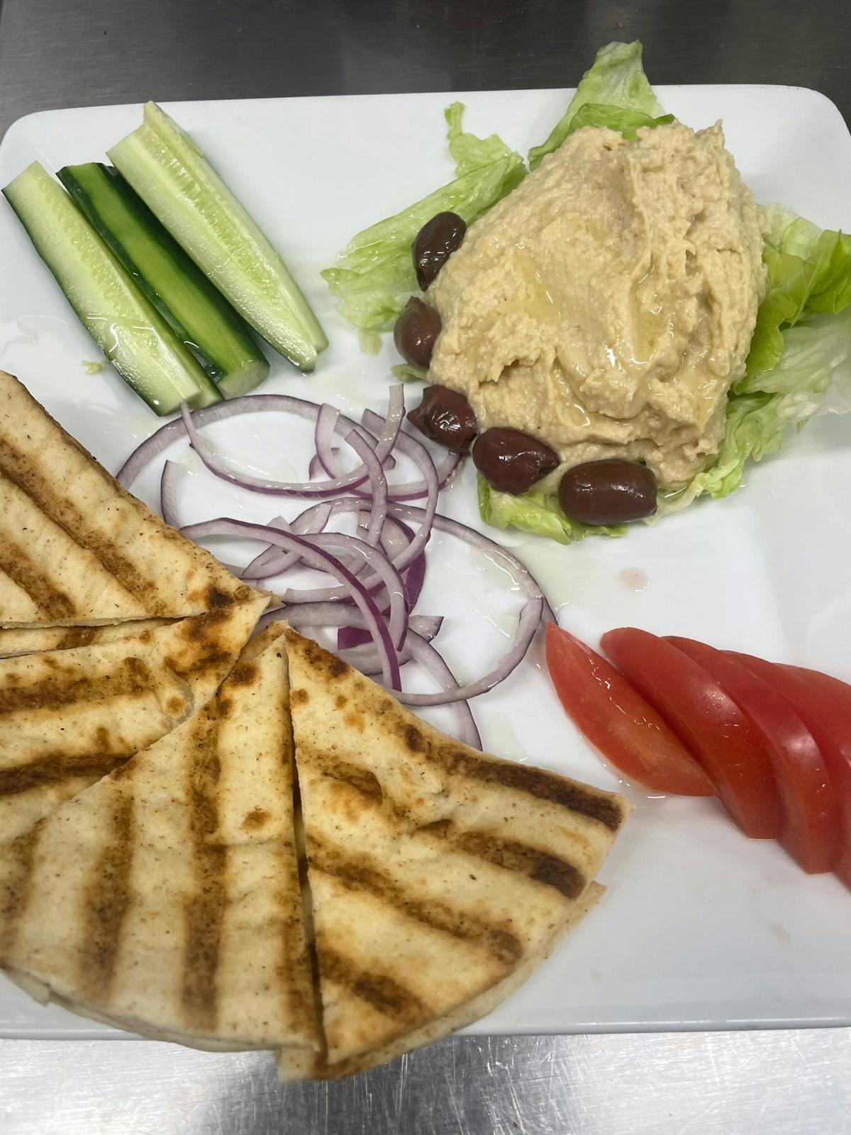 a plate of food with a slice cut out
