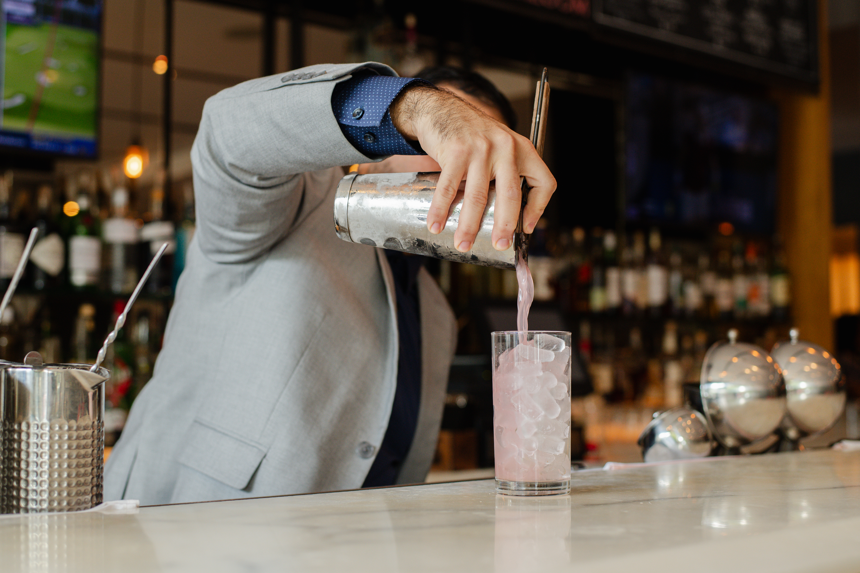 bartender pouring drink