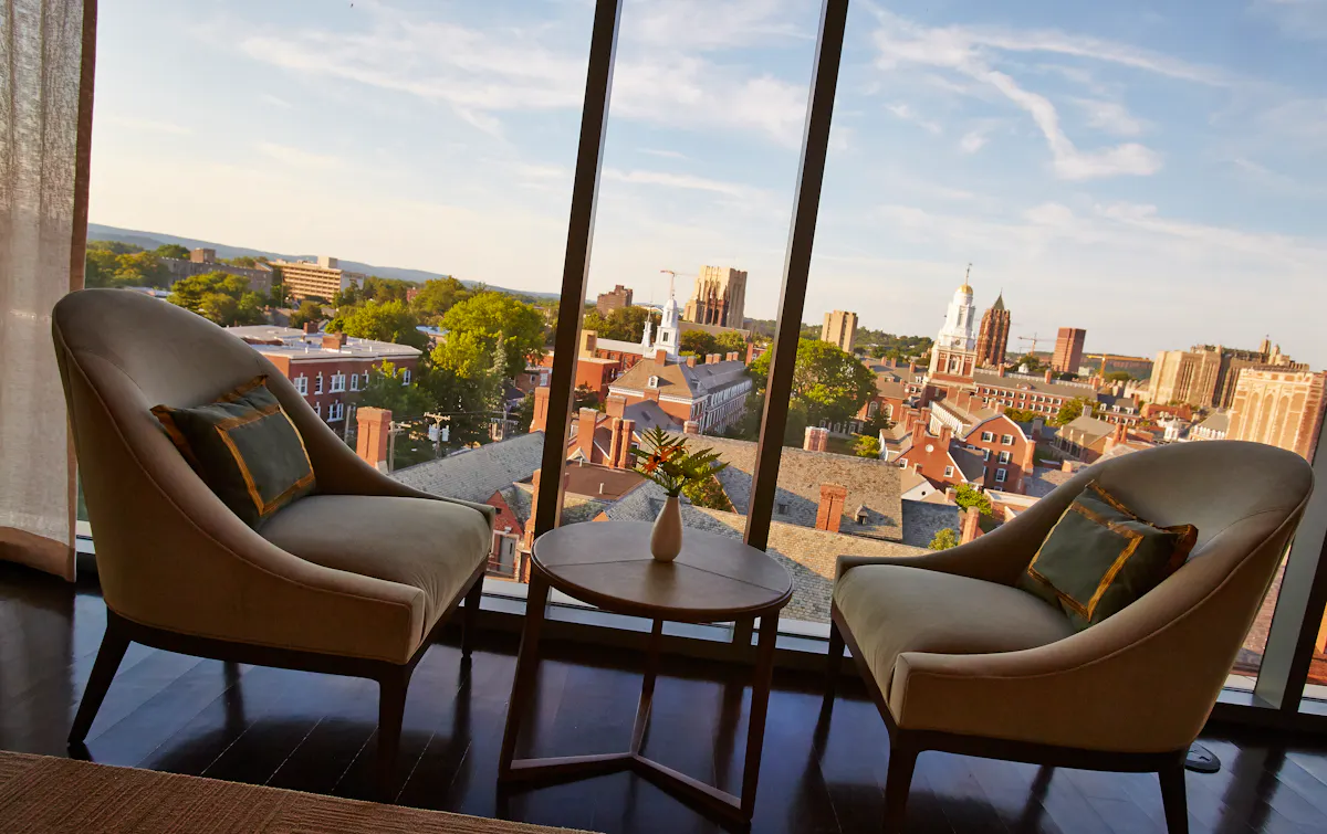 a chair sitting in front of a window