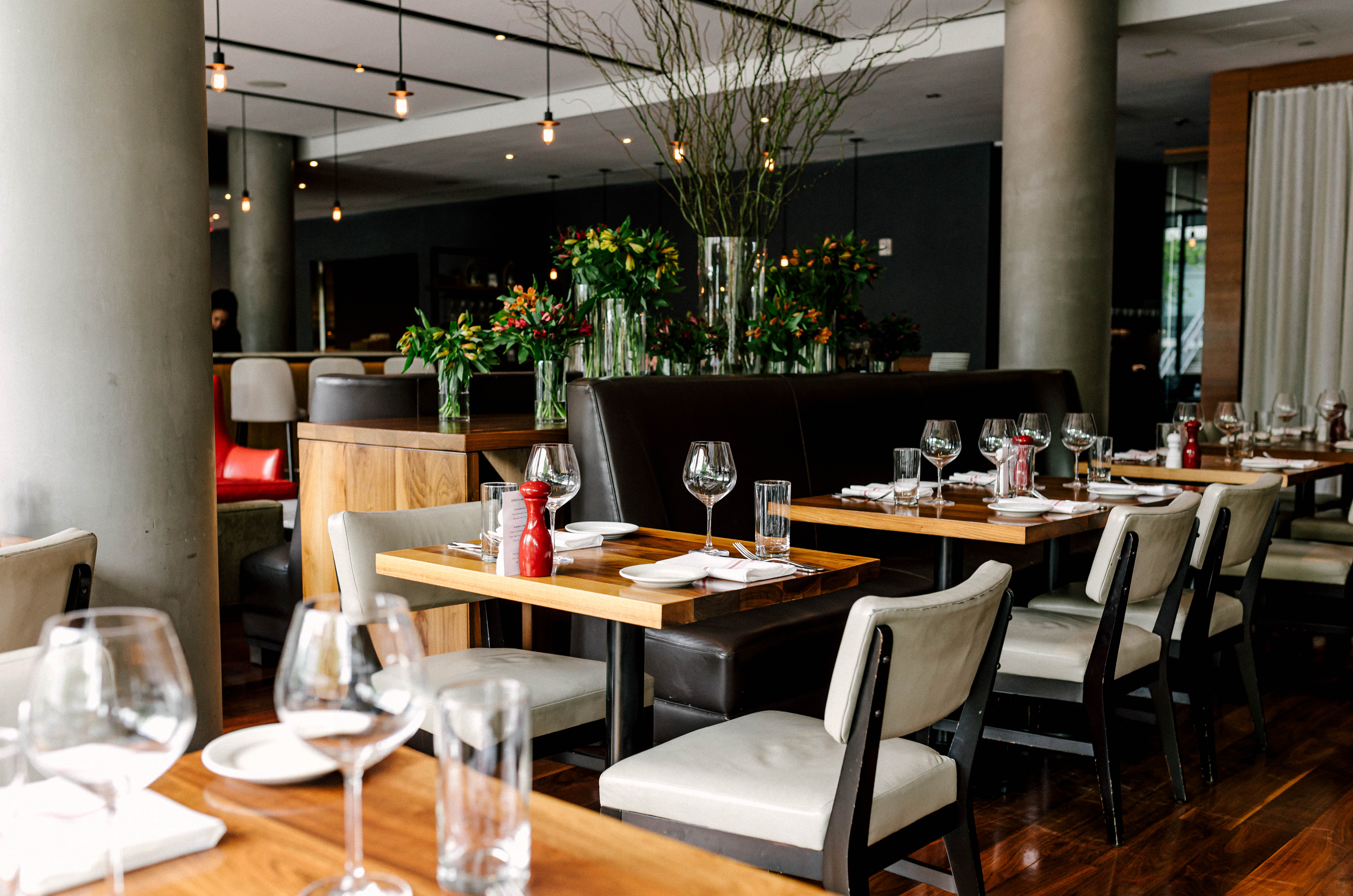 a restaurant with tables and chairs