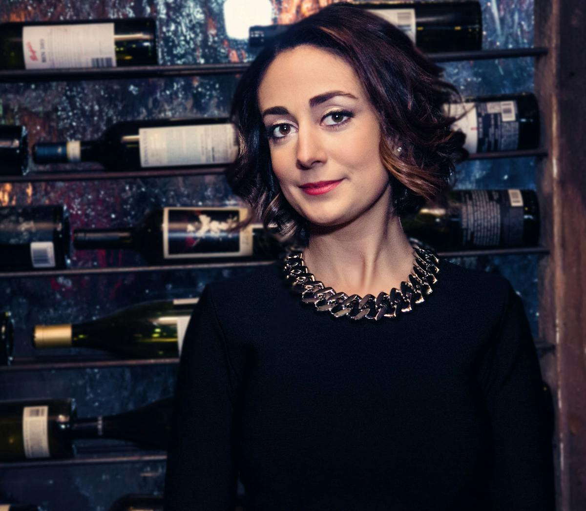 a woman standing in front of a store