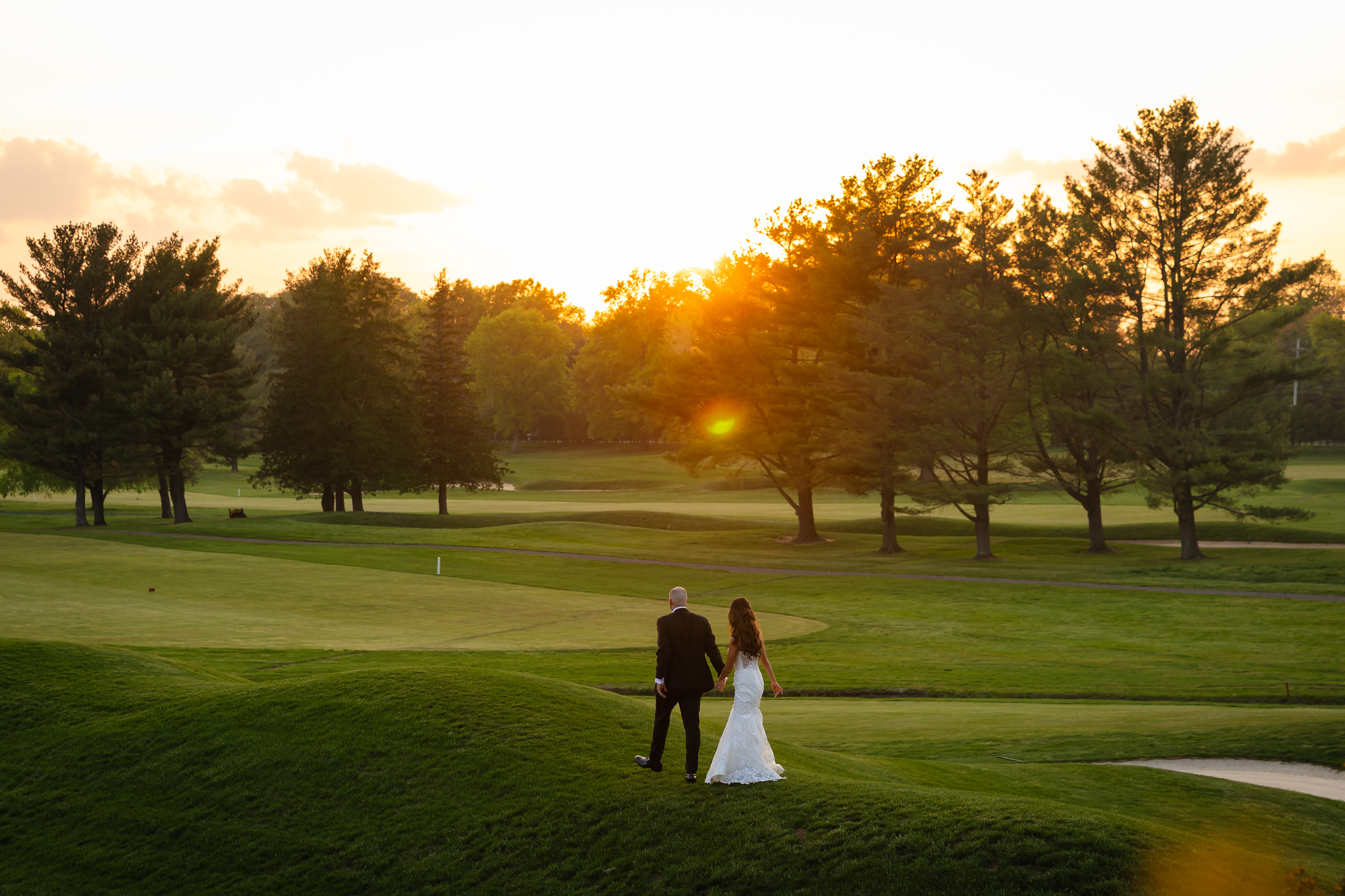 a person flying a kite at the park