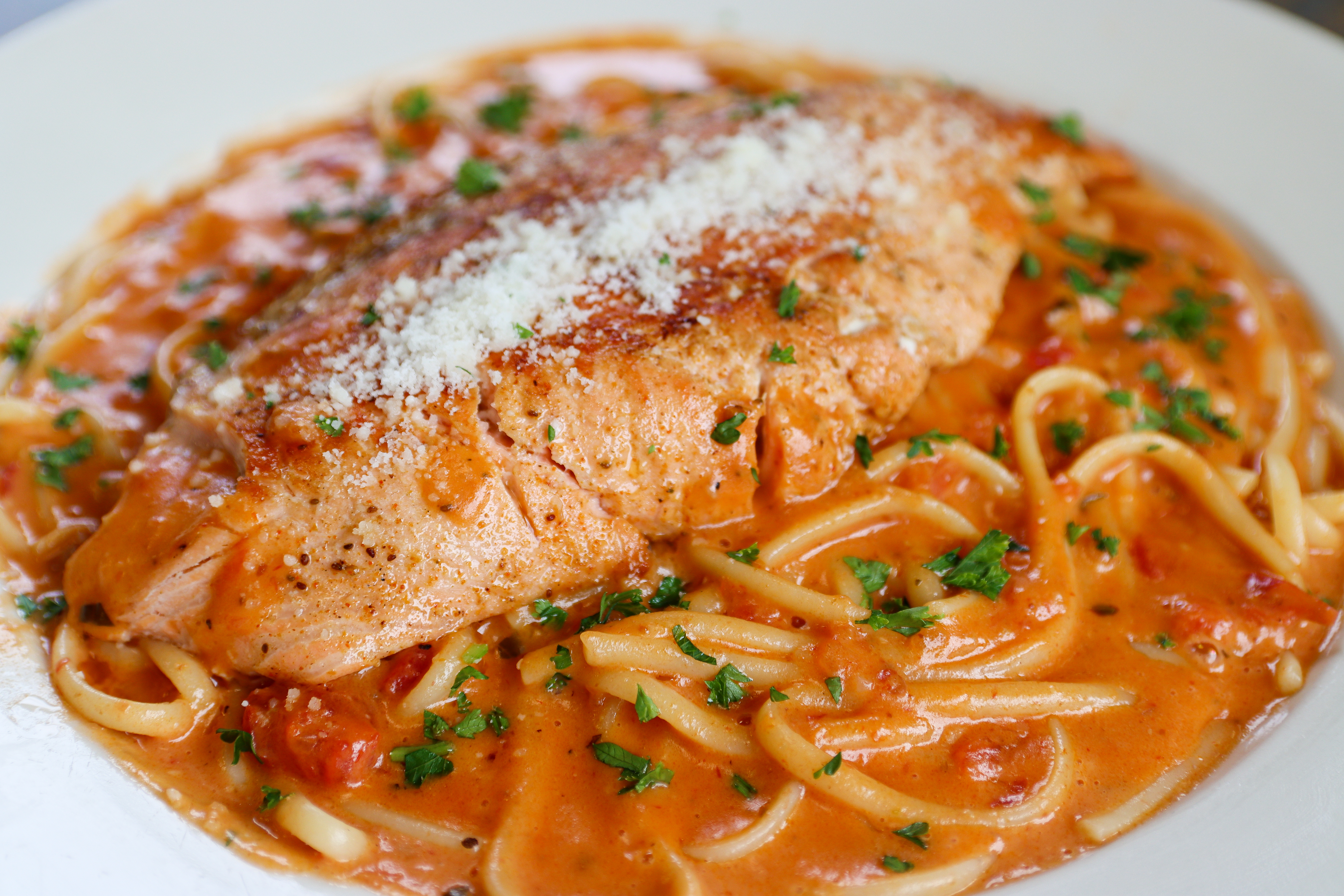 a close up of a plate of food with a slice of pizza