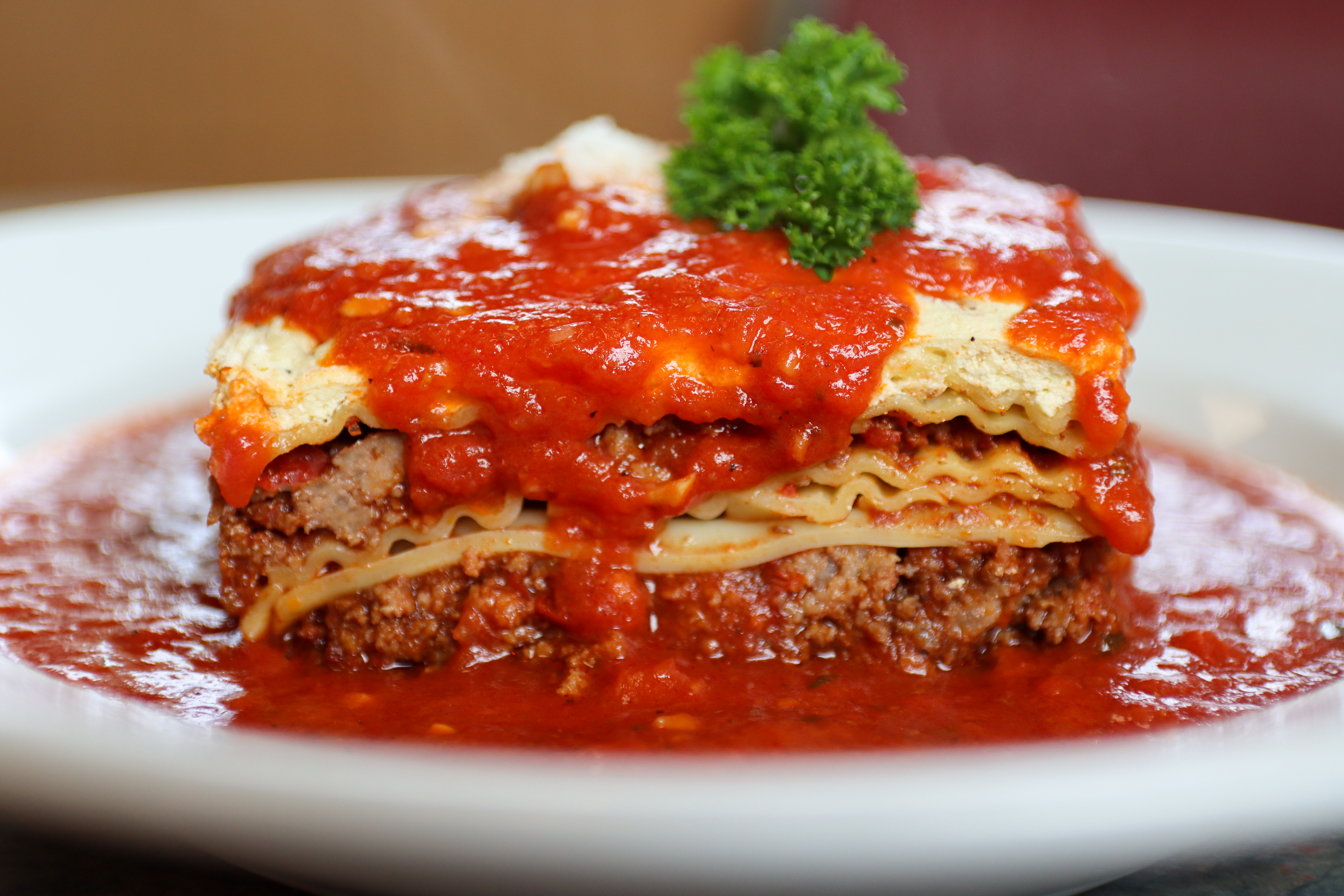 a close up of a plate of food with a slice of pizza