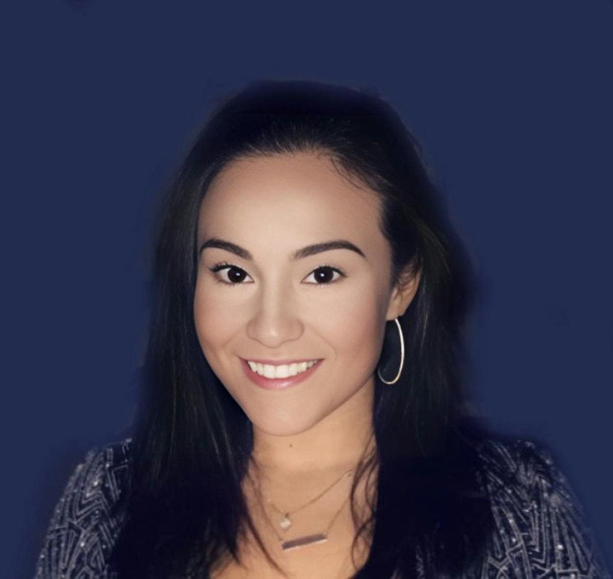a woman smiling for the camera