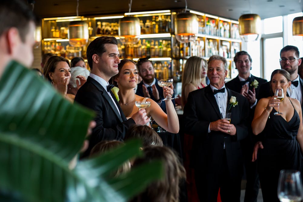 a group of people standing in a room