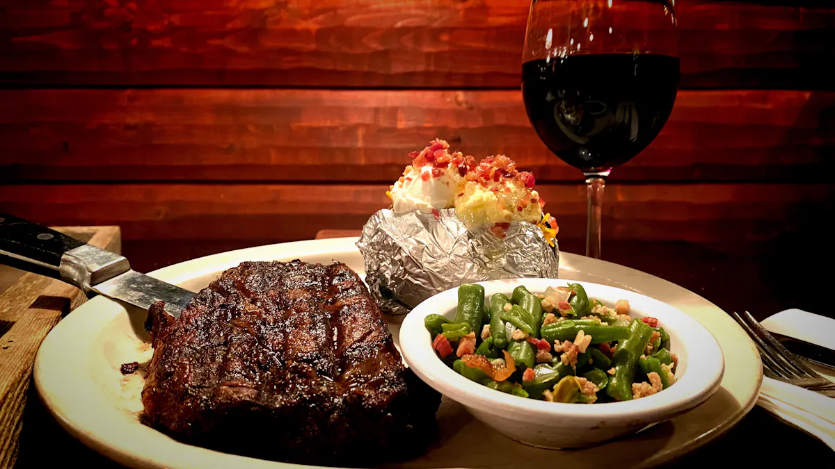 a plate of food and a glass of wine