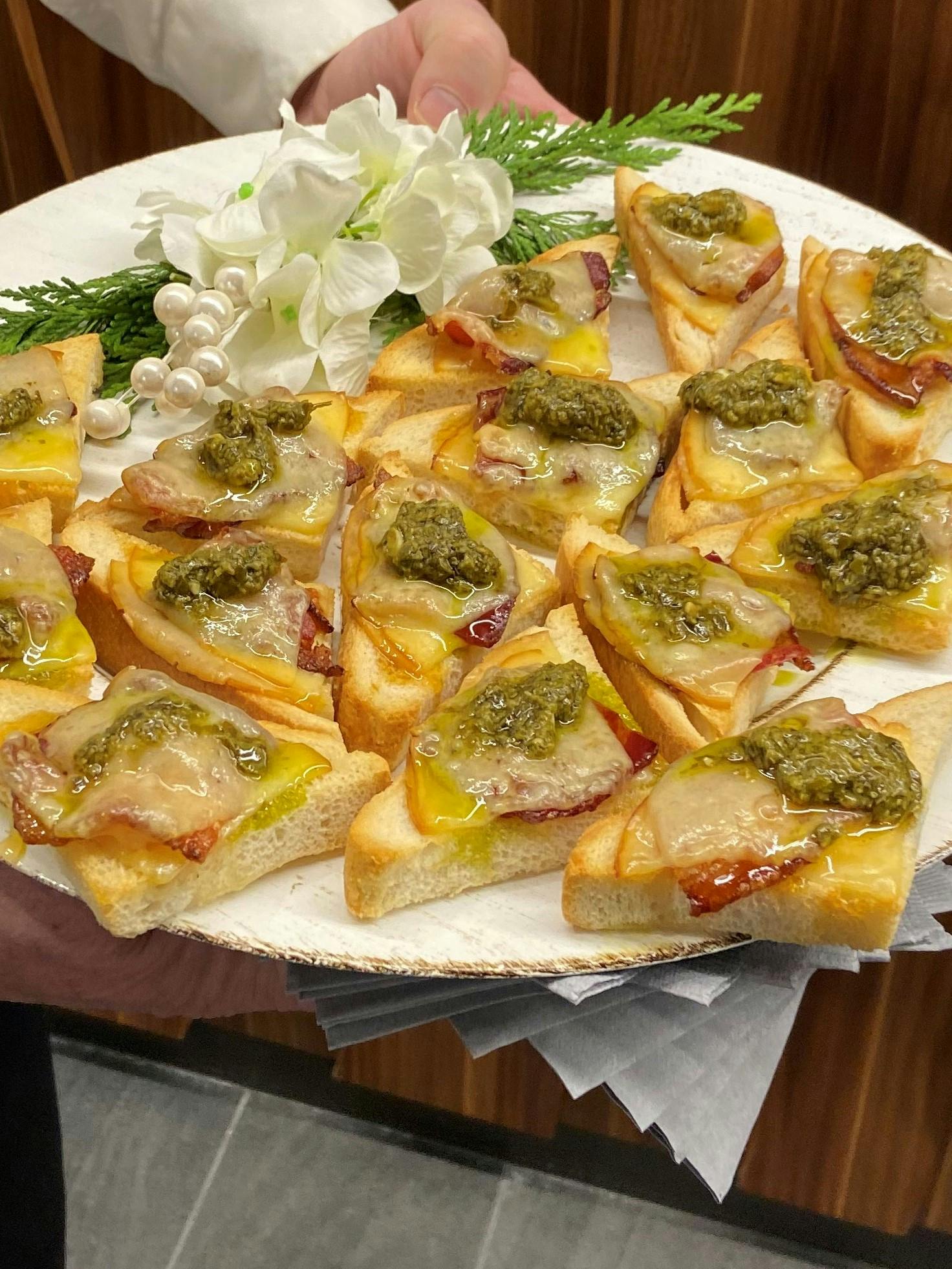 a pizza sitting on top of a wooden table