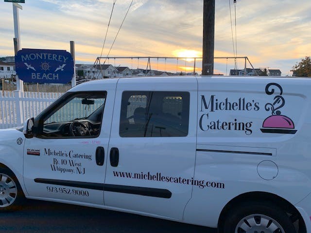 a van parked on the side of a road