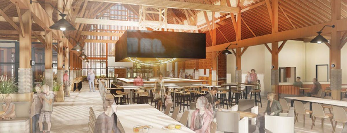 a group of people sitting at a table in a restaurant