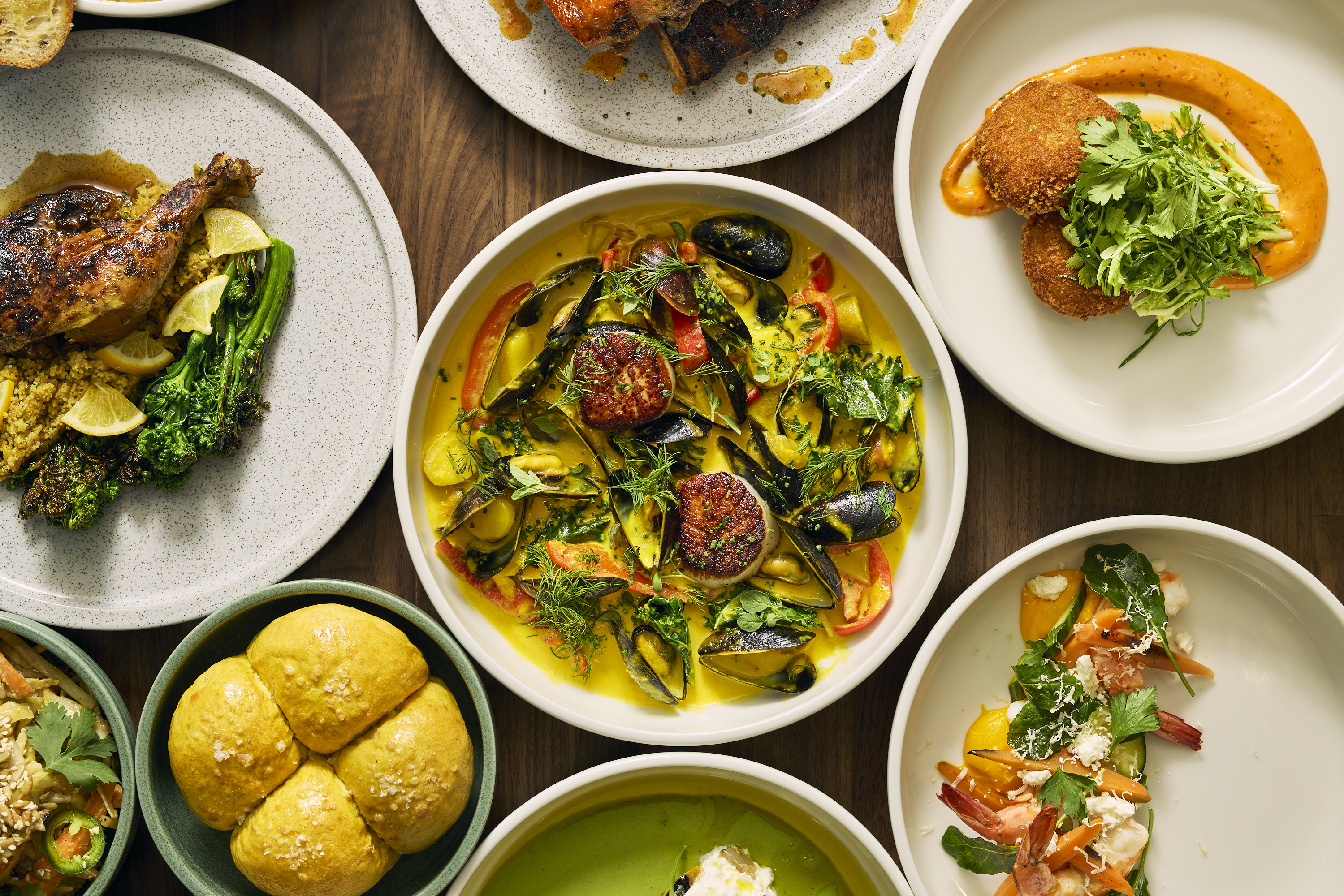 a bowl filled with different types of food on a table