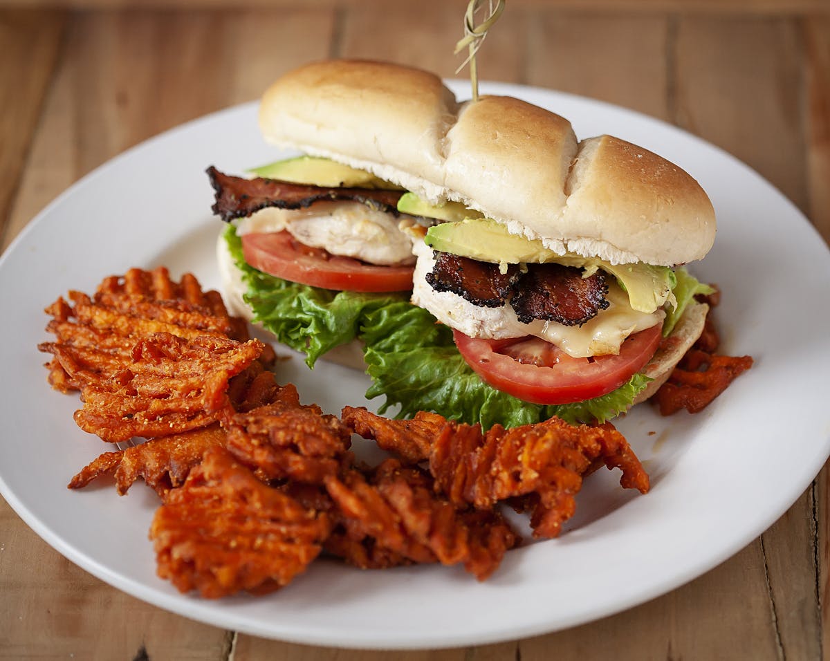 a sandwich on a white plate