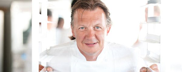 a man smiling for the camera