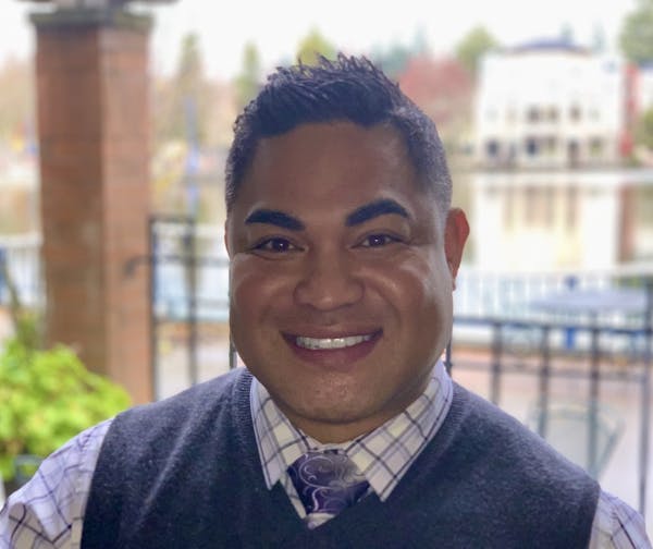 a man smiling for the camera