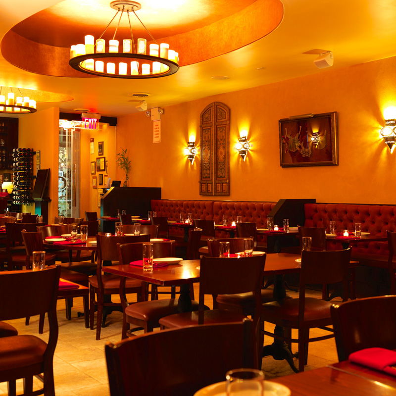 a restaurant with tables and chairs