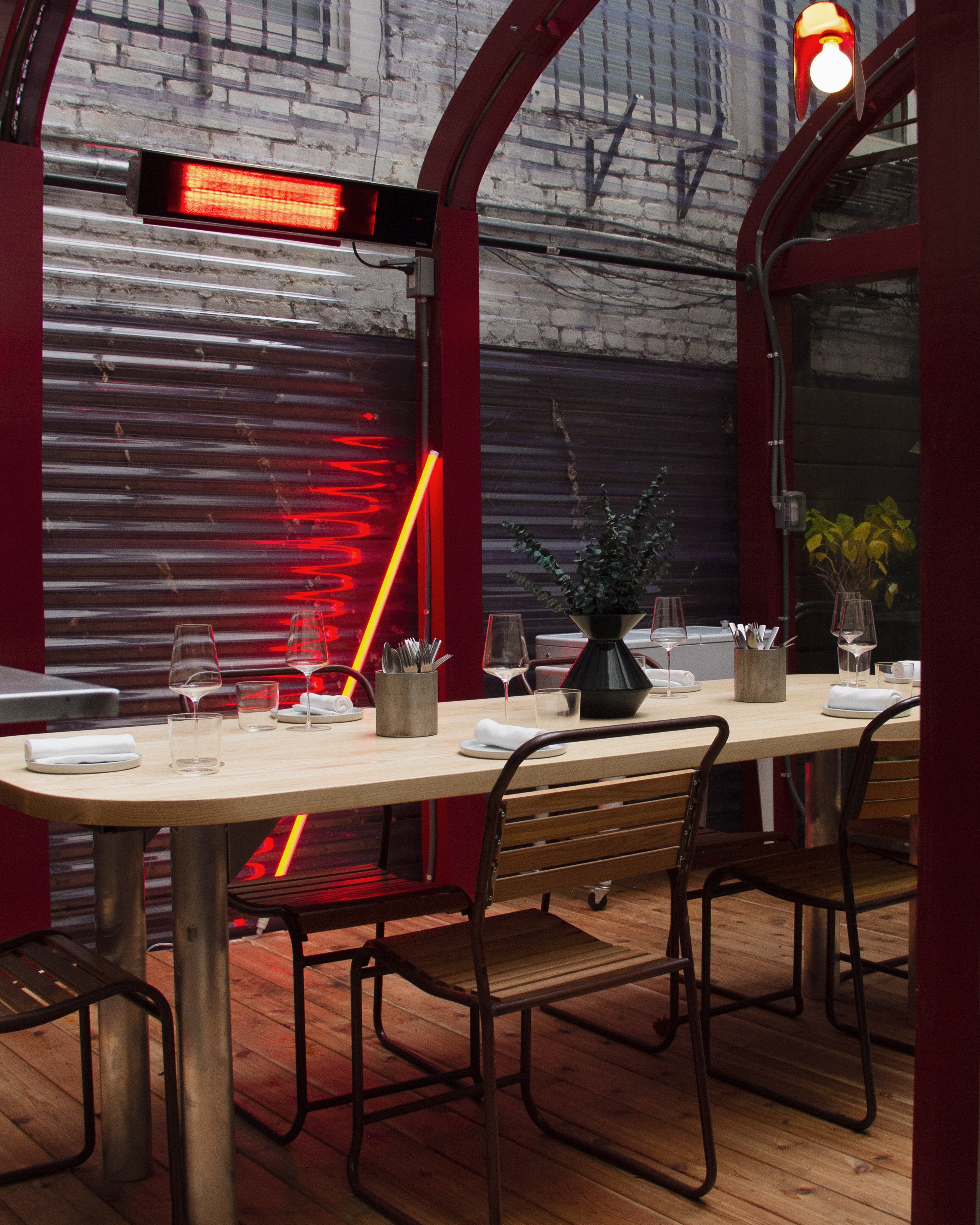 a dining room table in front of a building
