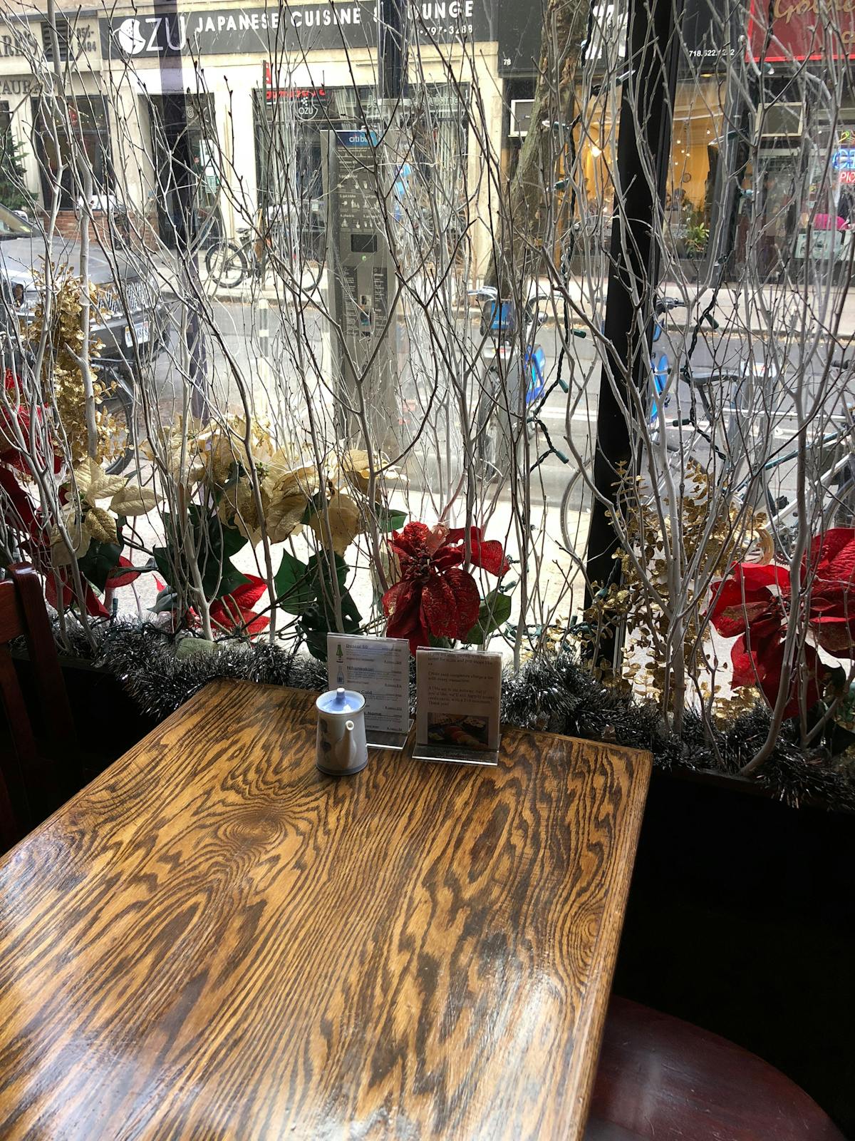 a vase of flowers sitting on a chair