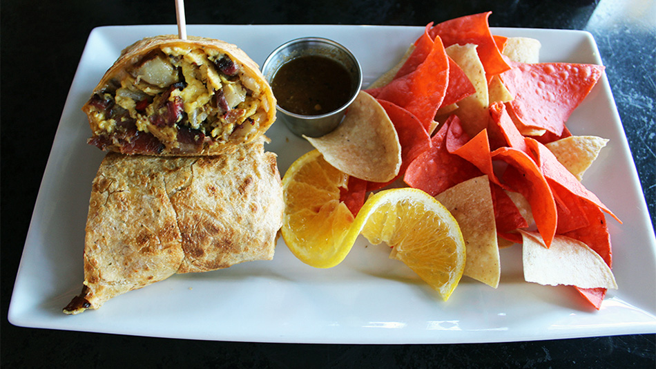 Tasty burrito and chips prepared by Oak Park breakfast food restaurant.