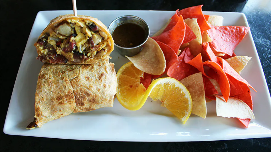 Tasty burrito and chips prepared by Oak Park breakfast food restaurant.