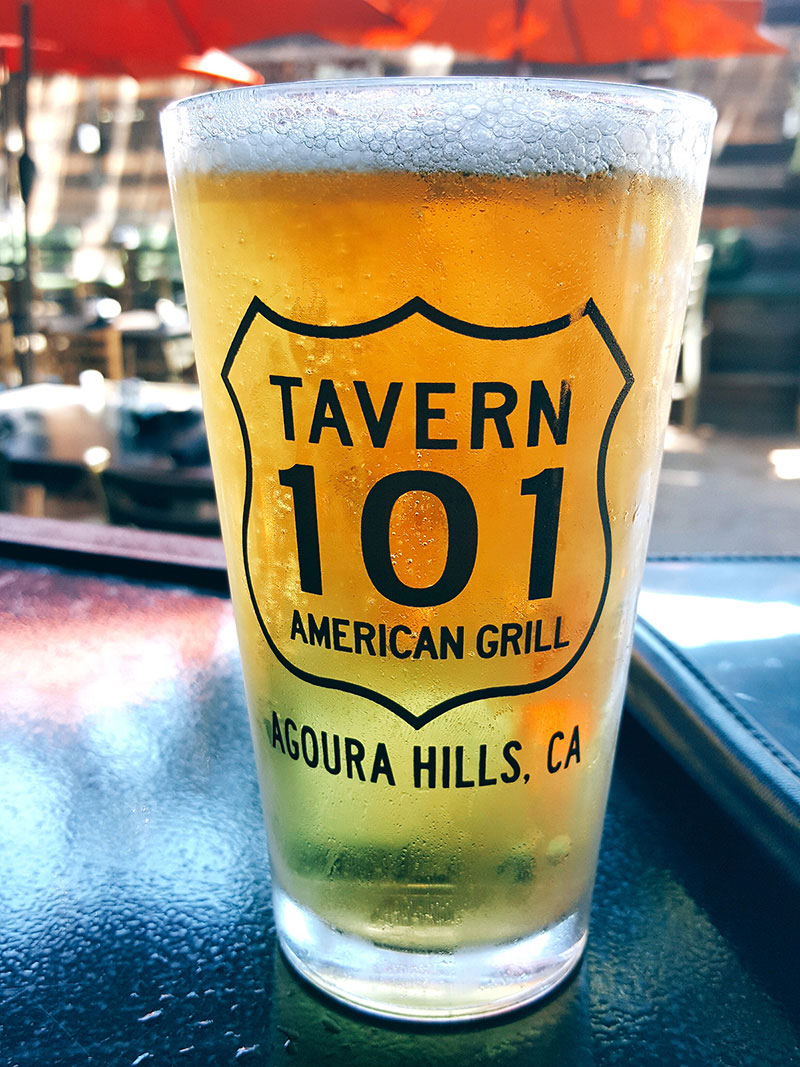 Glass of cold beer served by Calabasas sports bar & grill.