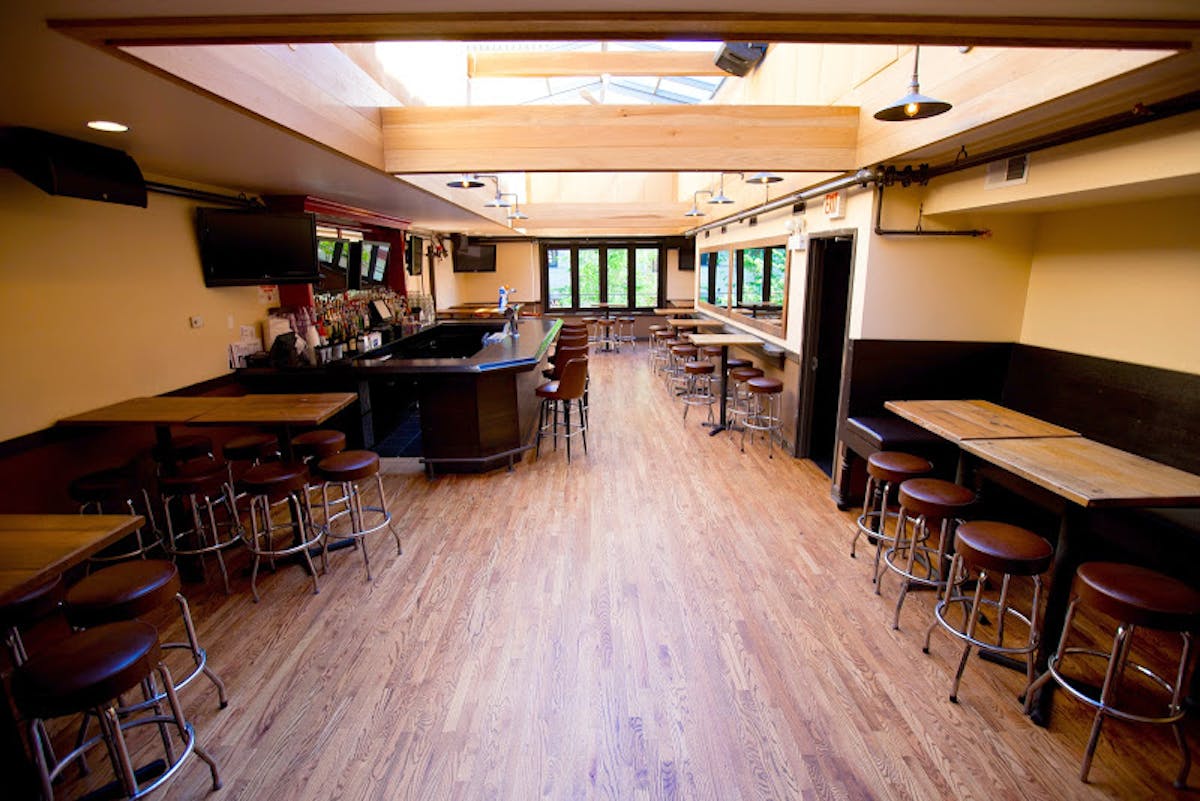 a room filled with furniture and a wood floor