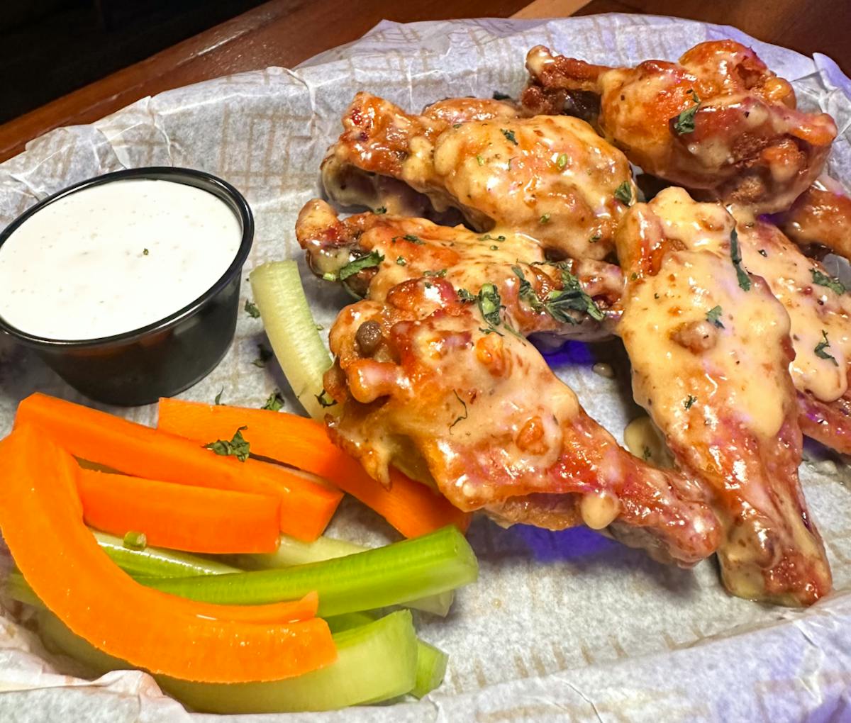 parmesan garlic wings with carrots, celery and a side of ranch