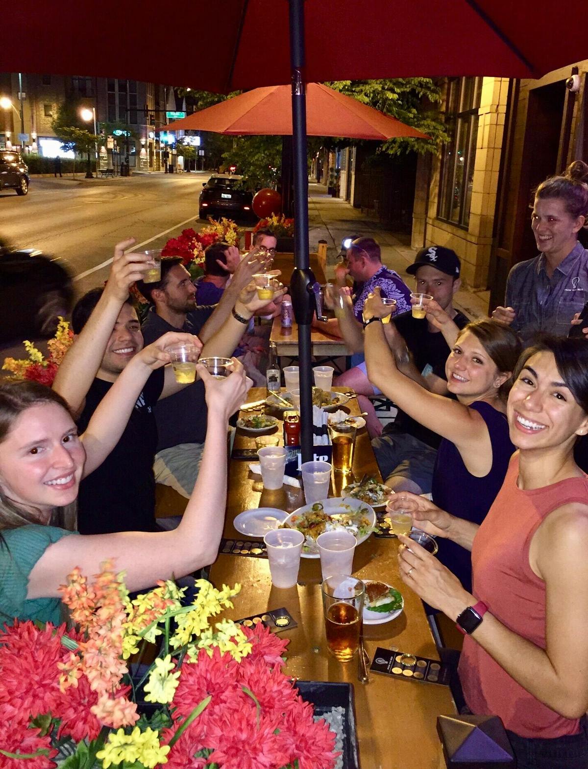 a group of people sitting at a table